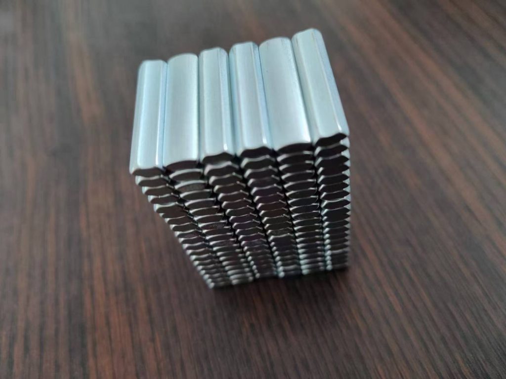 Finished custom arc magnets for industrial assembly